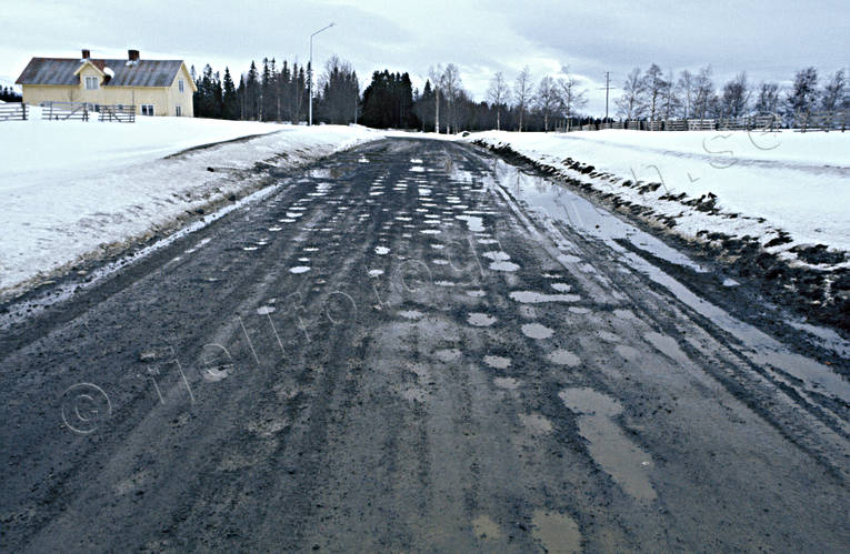 communications, frost damages, frozen ground, gravel road, grpper, land communication, local road, pot-hole, road bump, road damages, road pothole, traffic, vehicular traffic